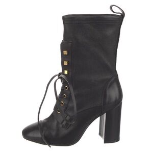 Stuart Weitzman Black Heeled Boots with Gold Accents